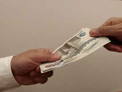 Egyptian Pound Banknotes Cash Exchange Between Two Hands