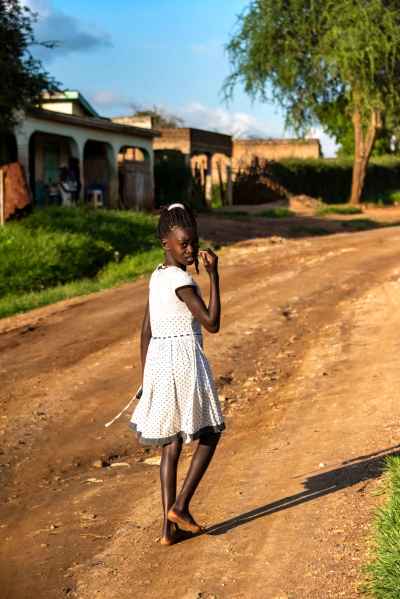 Young Girl on Dirt Road, Kaabong, Northern Uganda