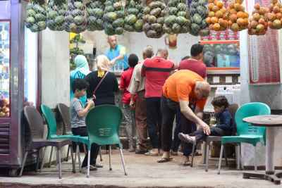 Crowds Ordering Juice at a Local Egyptian Juice Shop During Eid