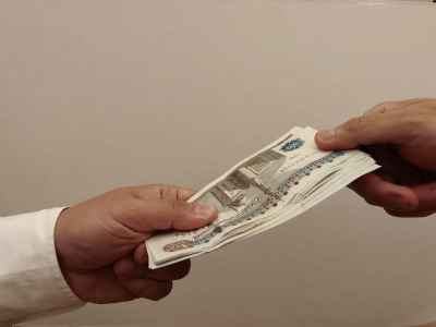 Egyptian Pound Banknotes Cash Transfer Between Two Hands