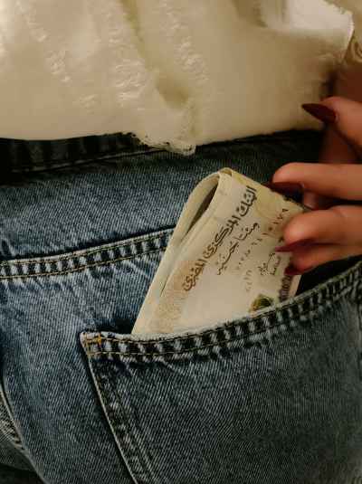 Egyptian Pound Banknotes in Denim Jeans Pocket