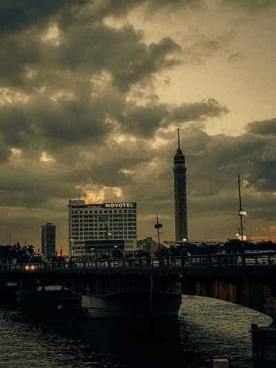 Qasr Al Nile Bridge and Cairo Tower at Dusk