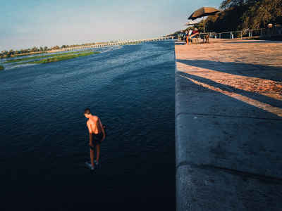 Child Swimming at Al-Qanater Al-Khayreya, Giza
