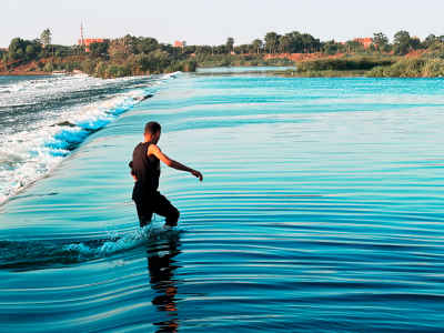 Child Wading in Nile Waters, Al-Qanater Al-Khayreya