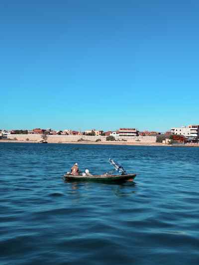 Fishermen in Small Boat on Lake Timsah, Ismailia