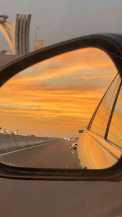 Sunset Reflected in Car Side Mirror, Alexandria Road