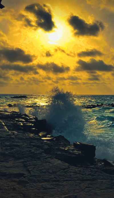 Waves Crashing on Rocky Shore, Green Beach Al-Alameen