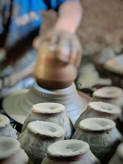 Potter Shaping Clay on Wheel, Al-Monofeya Egypt
