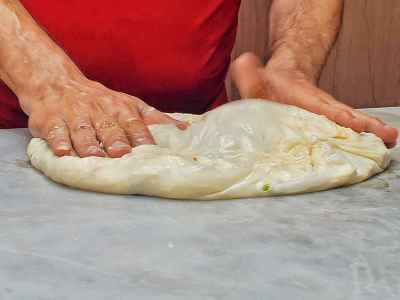 Baker Flattening Fateer Dough, Al-Hussein Cairo
