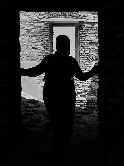 Person Silhouette in Ancient Stone Doorway, Ezbet El Borg