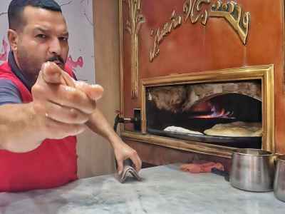 Baker at Wood-Fired Oven, Al-Hussein Cairo