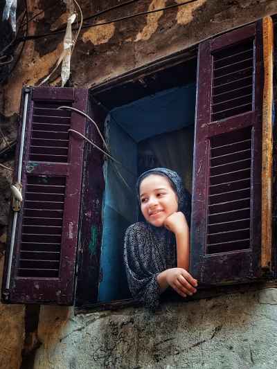 Smiling Girl at Old Wooden Window, Al-Gamaliya Cairo