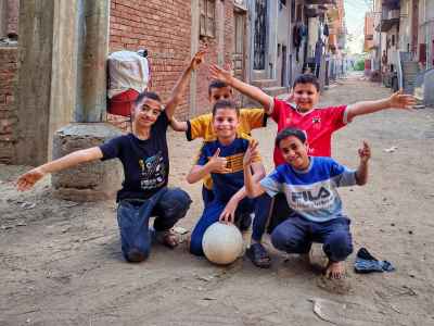 Boys Football Team with Ball, Village Street Al-Monofeya
