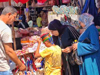Egyptian Family Shopping at Moulid Stall, Sayeda Zeinab