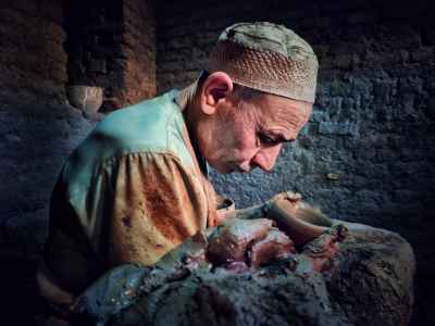 Potter Shaping Clay Vessel Edge, Al-Monofeya Egypt