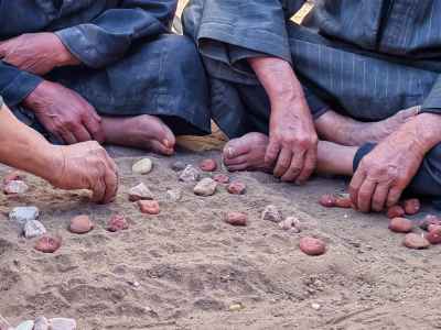 Elderly Men Playing Sabaa'awiya (Seega) in Rural Egypt
