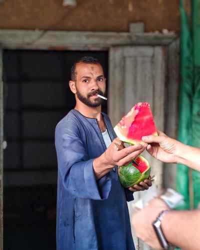 Watermelon Vendor Displaying Ripe Red Watermelons in Rural Monufia, Egypt