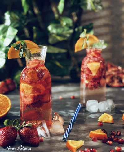 Summer Fruit Infused Drink with Strawberry Orange Pomegranate