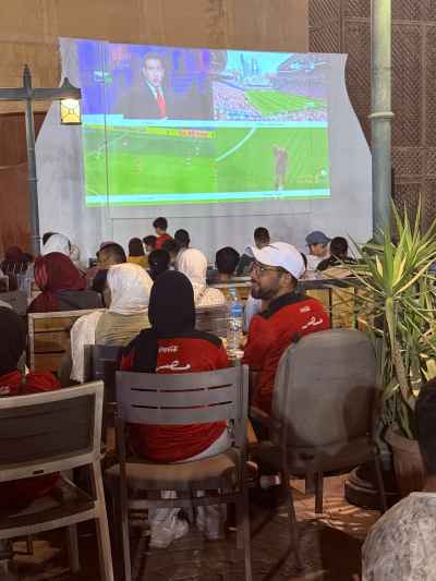 Egyptians Watching Football Match Together at Ahwa (local cafe)
