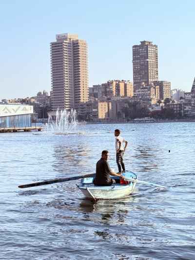 Fisherman and Son on a Boat in the Nile
