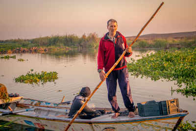 Fisherman Poling Boat on Lake Burullus, Egypt
