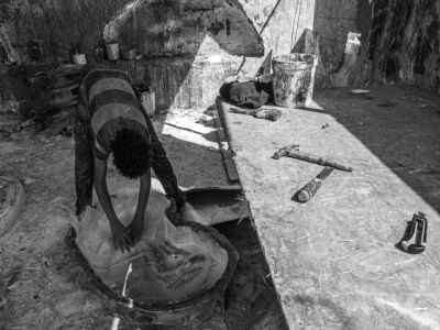 Fiberglass Worker Placing Raw Material, Cairo Workshop