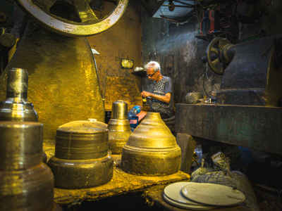 Hookah Assembly Worker in Traditional Cairo Workshop