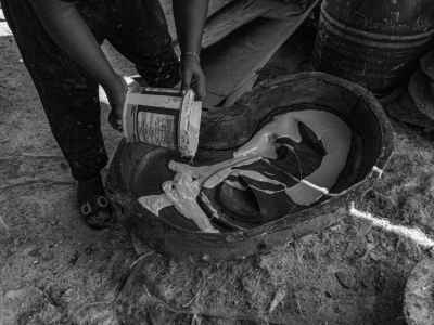 Craftsman Pouring Molding Material Into Mask Mold, Cairo