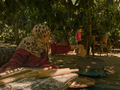Egyptian Woman Preparing Dough Outdoors, Ismailia