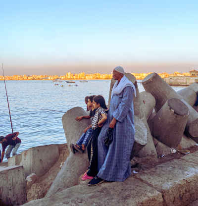 Family on Seafront Breakwater, Bahri Alexandria