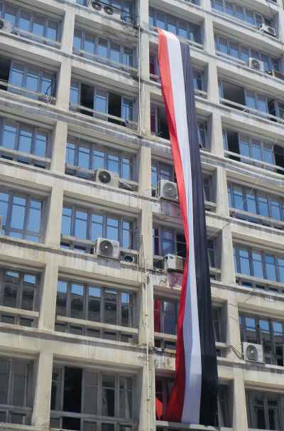 Egyptian Flag Displayed on Building Facade, Alexandria
