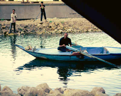 Fisherman in Rowboat on Nile Canal, Al-Qalyubia
