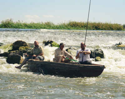 Fishermen on Wooden Boat, Al-Qanatir Al-Khayriyya, Egypt