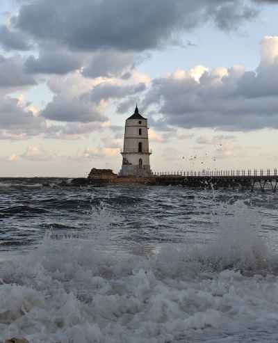 El Max Historic Lighthouse Amid Crashing Mediterranean Waves