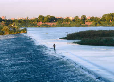 Fisherman Standing on Nile Weir, Al-Qanatir Al-Khayriyya