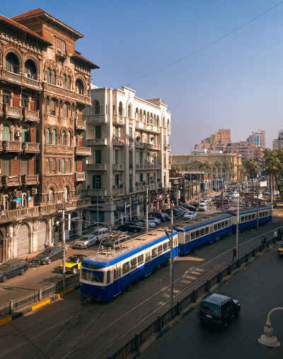 Alexandria Tram Passing Through Downtown Streets in the Early Morning