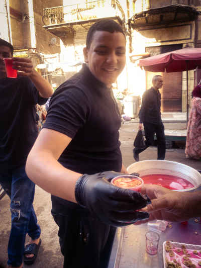 Sharbat Vendor Serving Festive Drink, Al-Manshiya Alexandria