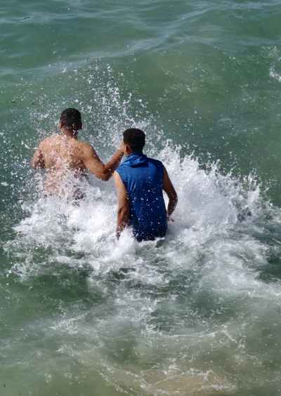 Two Men Playing in Mediterranean Sea Waves, Alexandria