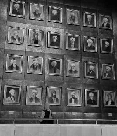 Visitor Contemplating Muslim Scholars Portrait Gallery, Bibliotheca Alexandrina