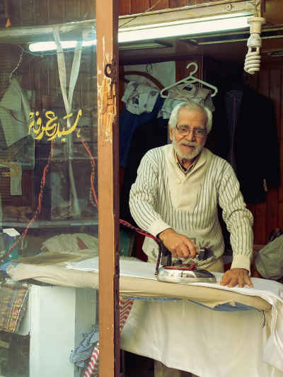 Egyptian Ironing Man (Makwagi) at Shop, Alexandria