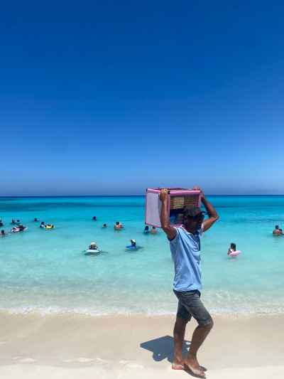 Freska Wafer Vendor Walking Along the Beach in Marsa Matrouh, Egypt