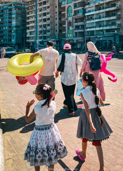 Family Heading to Beach with Inflatables, Alexandria