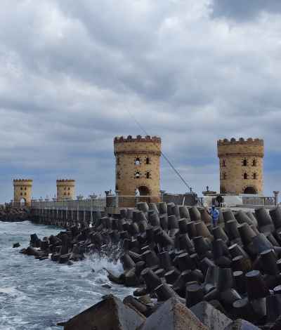 Fisherman at the Qaitbay Citadel Stone Bridge & Towers