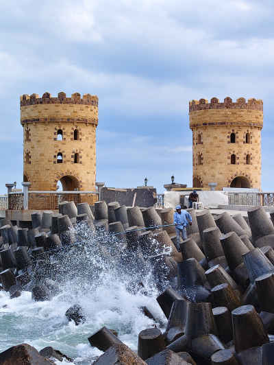 Fisherman on the Breakwaters of Qaitbay Promenade in Alexandria