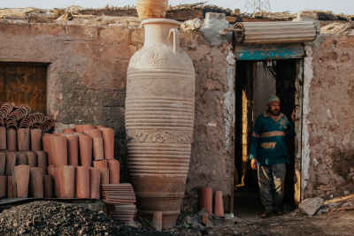 Potter Beside Large Clay Vessel, Kom Oshim Fayoum