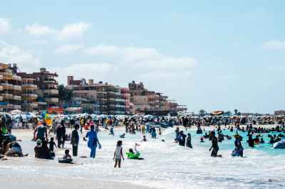 Families Swimming at Marsa Matruh Beach, Egypt