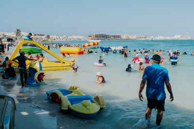 Families Swimming at Marsa Matruh Beach, Egypt