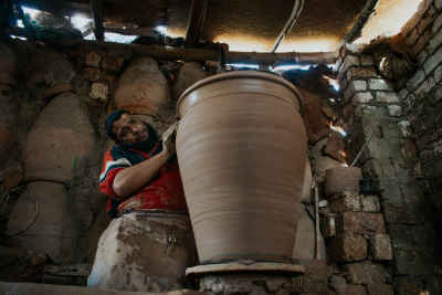 Potter Handling Large Clay Vessel, Kom Oshim Fayoum