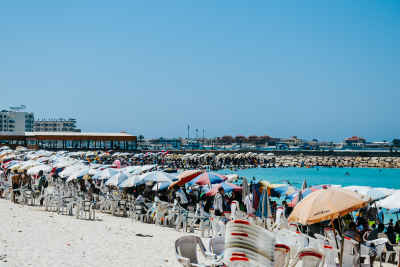 Crowded Beach with Colorful Umbrellas, Marsa Matruh