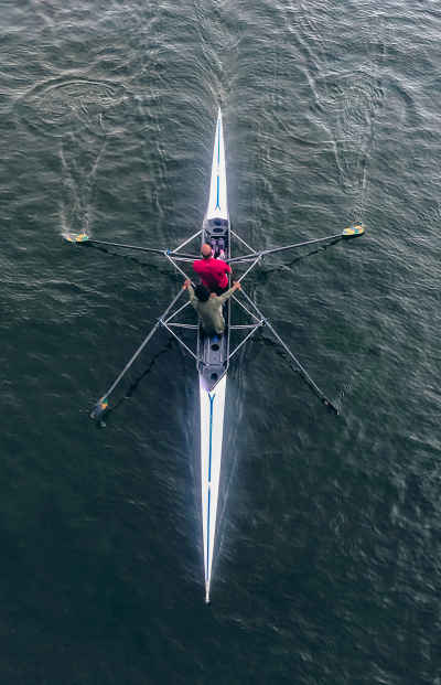 Aerial View Rower in Sculling Boat on Open Water